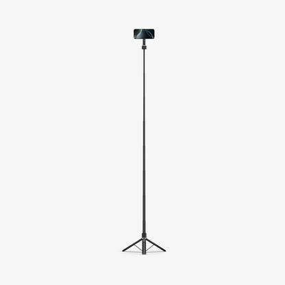 AMP09534 - s581w selfie stick magfit in black showing the front of the device, attached to a selfie stick, extended with a stand