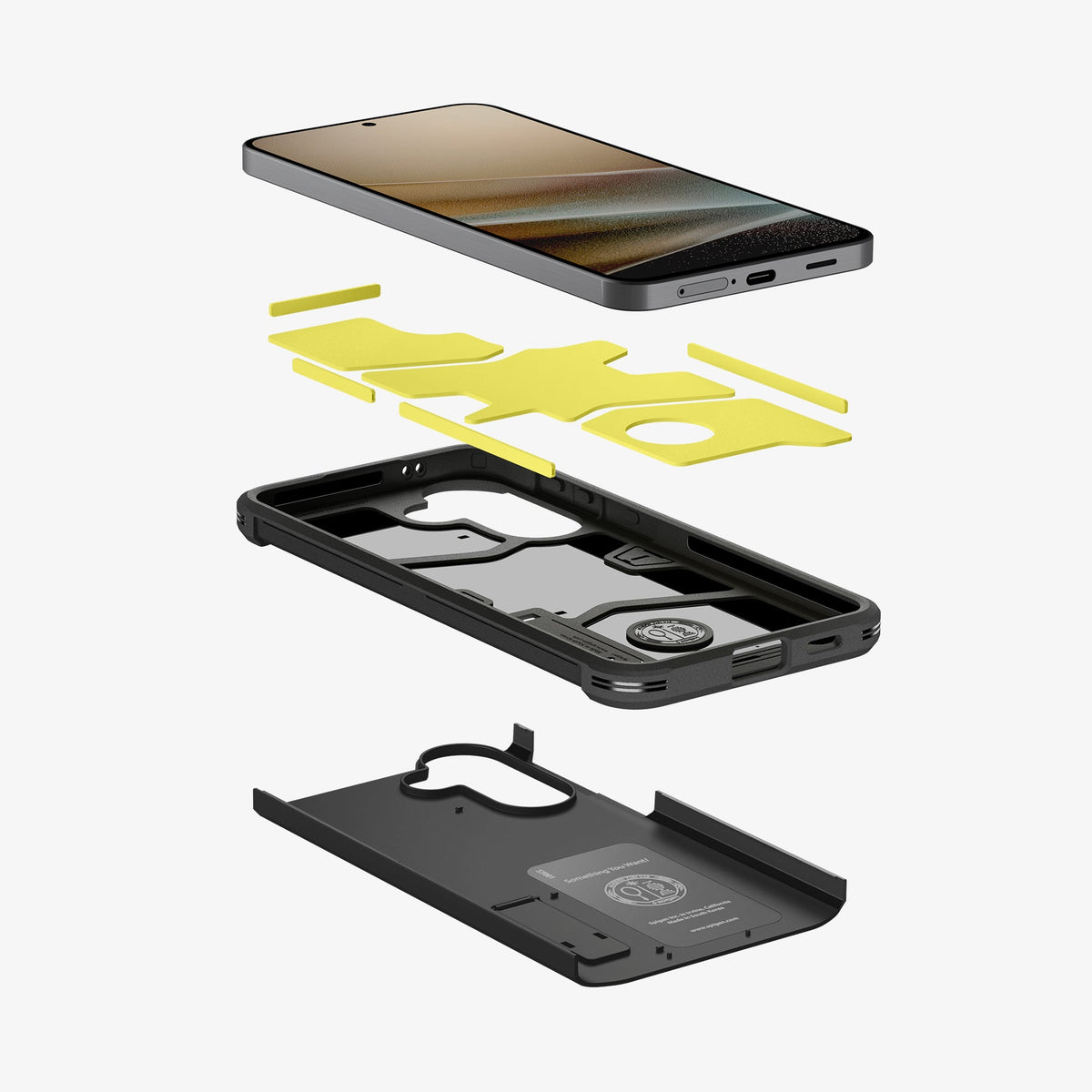 ACS11125 - Spigen Tough Armor Galaxy A57 5G case in Black - full exploded layer view showing phone, yellow Flex-ion shock absorption layer, inner TPU frame, and outer PC shell