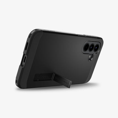 ACS11125 - Spigen Tough Armor Galaxy A57 5G case in Black - angled back view with built-in kickstand deployed