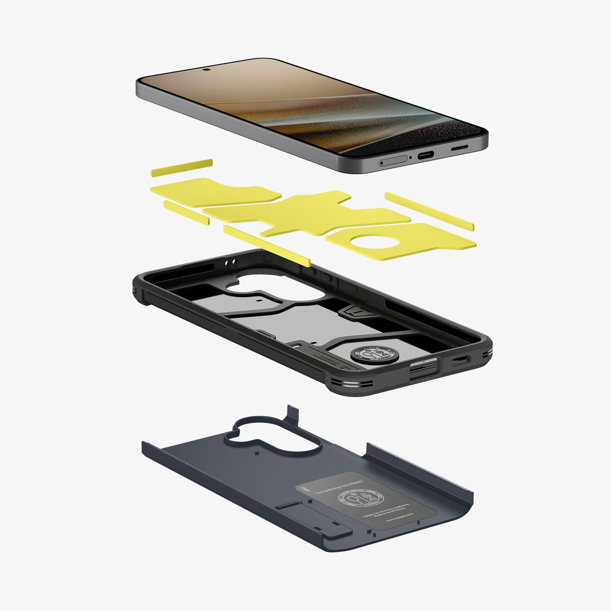 ACS11126 - Spigen Tough Armor Galaxy A57 5G case in Metal Slate - full exploded layer view showing phone, yellow Flex-ion shock absorption layer, inner TPU frame, and outer PC shell