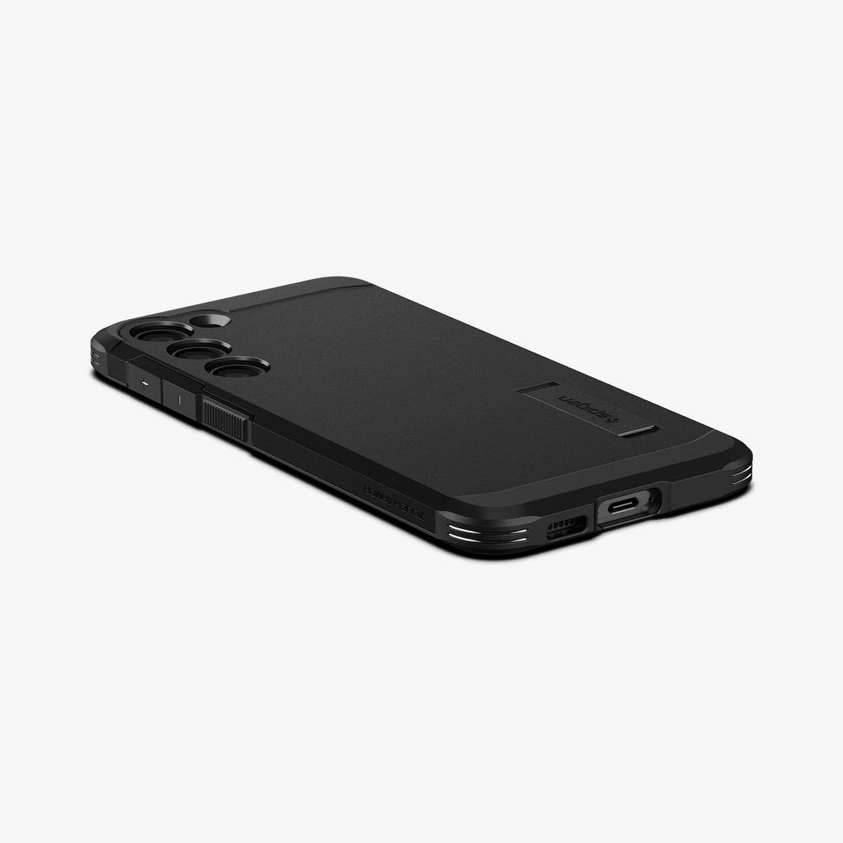 ACS05672 - Galaxy S23 Plus Case Tough Armor in black showing the back, side and bottom with device laying flat