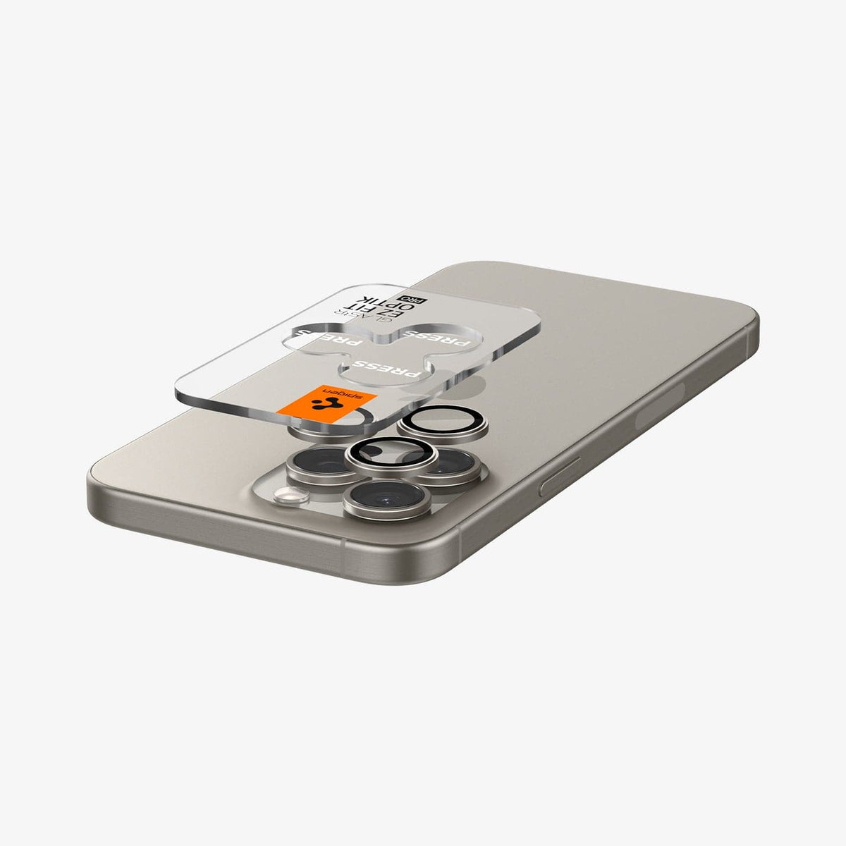 AGL07163 - iPhone 16 Pro / 16 Pro Max Optik Pro Lens Protector in natural titanium showing the ez fit tray and lens protector hovering above the camera lens