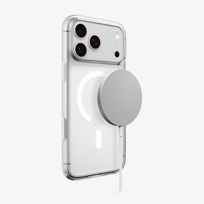 ACS11912 - iPhone 18 Pro Max / iPhone 17 Pro Max Crystal Flex (Mag Fit) showing the built-in magnetic ring securely attached to a magnetic charging accessory.