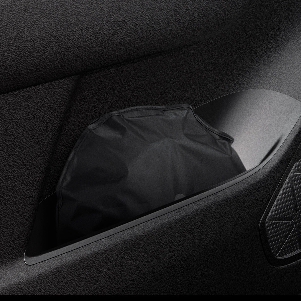 ACP09110 - Wrangler (2024) CryoShade JO260 in Black showing the sunshade kept and stored inside the vehicle without taking so much space
