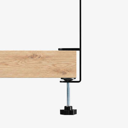 AHP11400 - Clamp Pegboard | LD405 showing close up of single clamp leg gripping edge of wooden desk with threaded bolt and star knob tightened