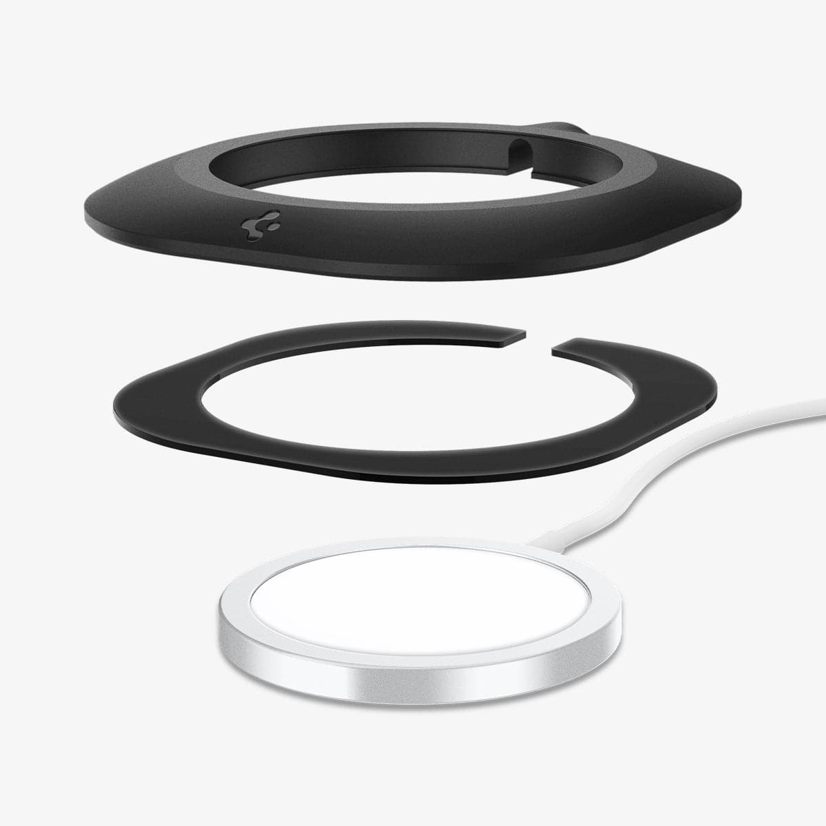 AMP03708 - MagFit in black showing the multiple layers of station hovering above the magsafe charger