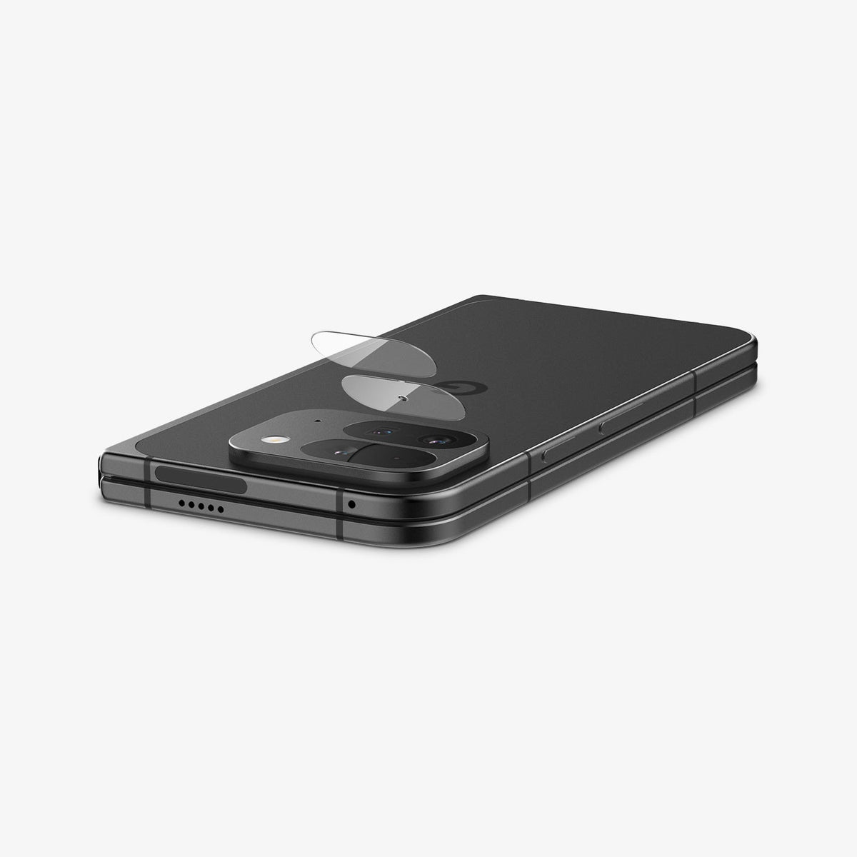 AGL09107 - Pixel 9 Pro Fold Optik EZ Fit Lens Protector in Crystal Clear showing the lens protector partially hovering in front of the camera lens