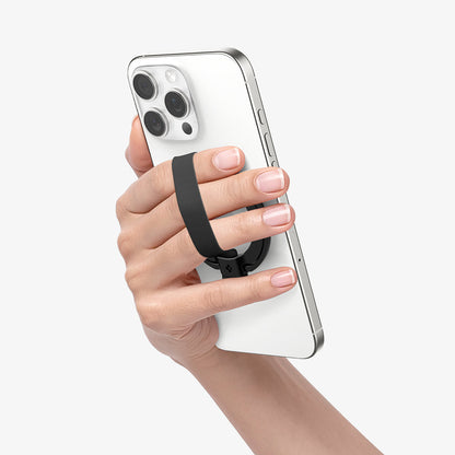 AMP08551 - O-Mag Magnetic Phone Holder (MagFit) | OM103 in Black showing a person holding the ring holder attached to the device