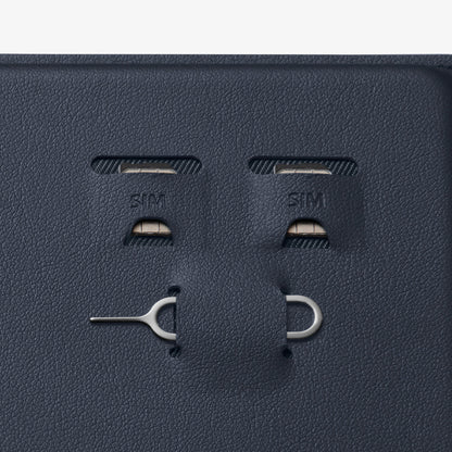 AFA08721 - Passport Holder in Navy Blue showing the sim slots for sim cards and a pin ejector