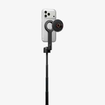 AMP11372 - Selfie Stick | S582W in Black showing an extended pole with mounted smartphone and magnetic remote attached for convenient wireless shooting.