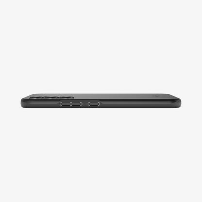 ACS05883 - Galaxy A54 5G Case Thin Fit in Black showing the side partial back on a flat surface