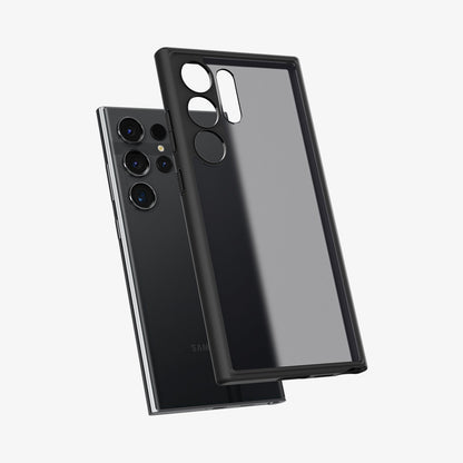 ACS07296 - Galaxy S24 Ultra Case Ultra Hybrid in Frost Black showing the back of semi transparent back case with darker frame hovering above the device