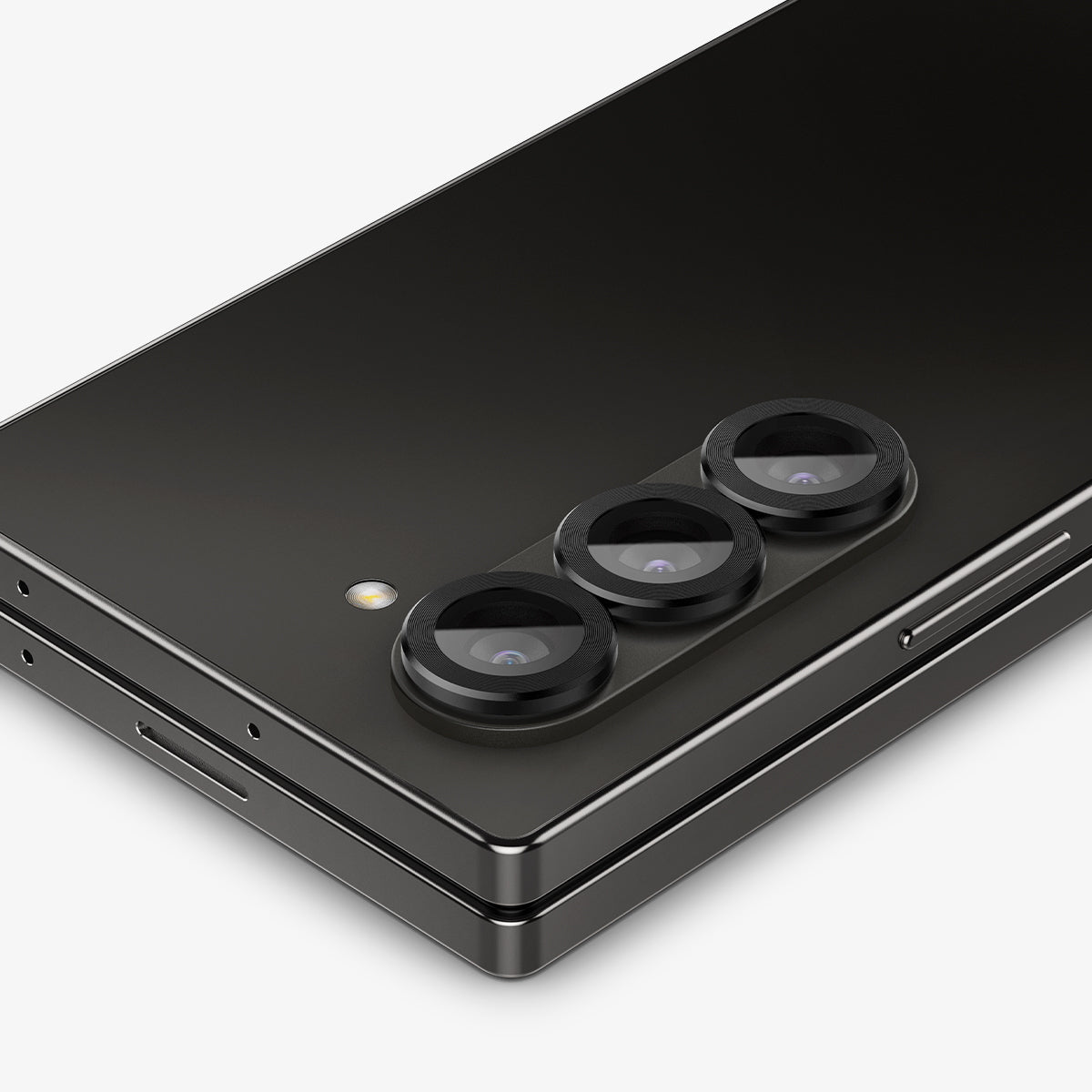 AGL07970 - Galaxy Z Fold 6 Optik Pro EZ Fit Lens Protector in Black showing the partial back zoomed in, lens installed on the camera lens