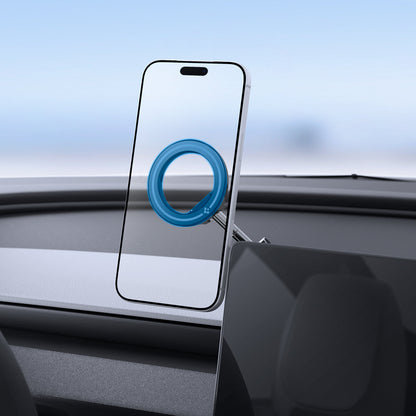 ACP11657 - Spigen MagSafe car mount holding iPhone on dashboard with magnetic ring attachment