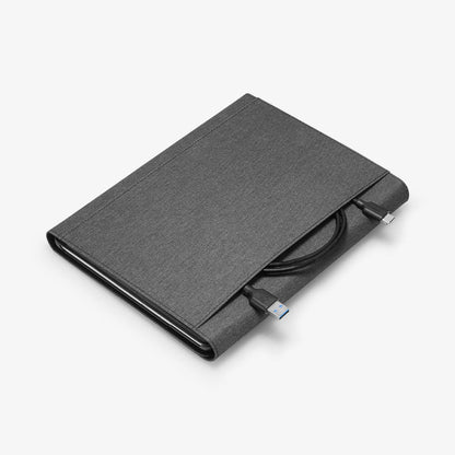 J06CS25185 - Surface Go 3 Case Stand Folio in charcoal gray showing the back with charging cable sticking out of storage slot