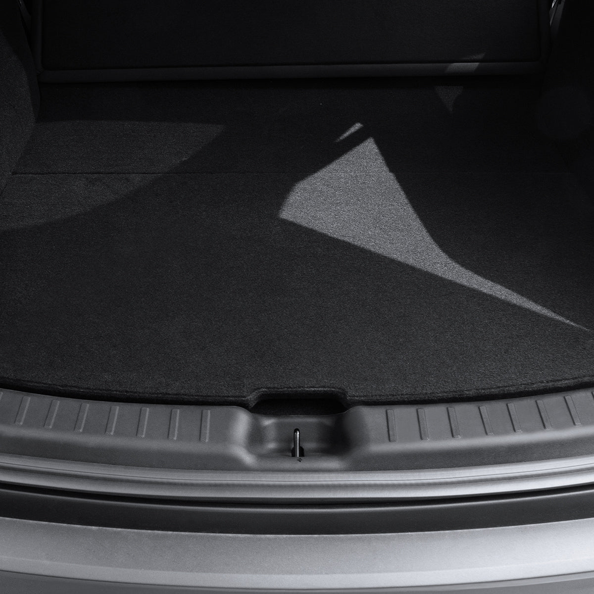 ACP09759 - Tesla Model Y Juniper Trunk Sill Guard | TG100-YJ in black showing the top view with guard installed