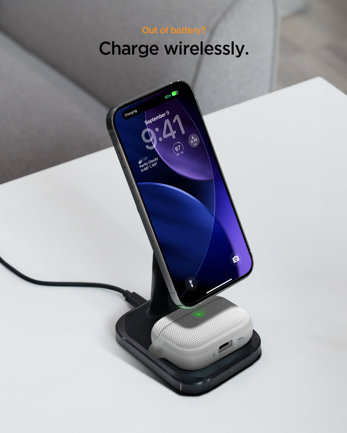 ACS11144 - AirPods Pro 3 Classic Fit case charging wirelessly on a desk with a smartphone on a charging stand, showing LED indicator and textured fabric finish