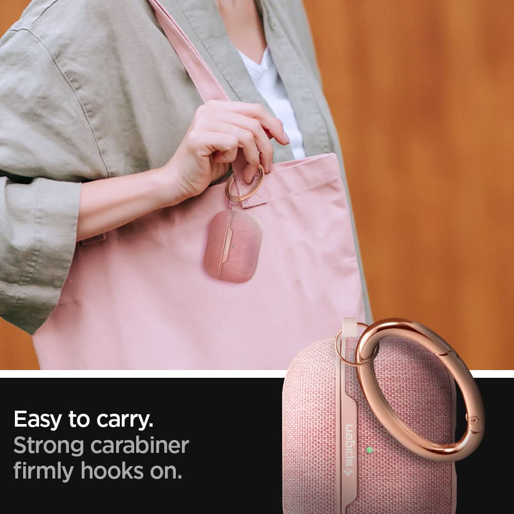 ASD00575 - Apple AirPods Pro Case Urban Fit in rose gold showing how it is easy to carry. Strong carabiner firmly hooks on