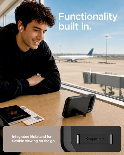 ACS11443 - Pixel 11 Tough Armor (Mag Fit) Black case standing with the built in kickstand for hands free viewing on a table.