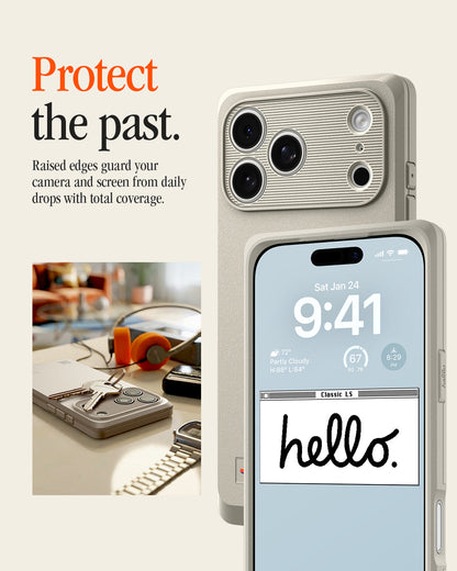 ACS10479 - iPhone 17 Pro Classic LS MagFit showing the case's raised camera bezel and screen edge, with a lock screen reading "Classic LS hello." beside a desk scene.