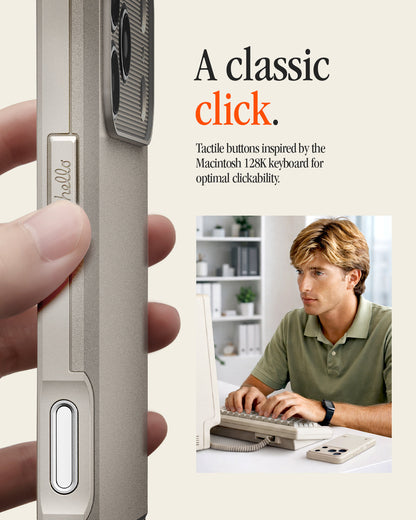 ACS10479 - iPhone 18 Pro / iPhone 17 Pro Classic LS MagFit case showing a hand pressing the case's tactile side button, next to a man typing on a vintage Macintosh keyboard.
