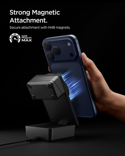 ACH10398 - Spigen 3-in-1 Fast Wireless Charger showing strong magnetic attachment holding phone securely