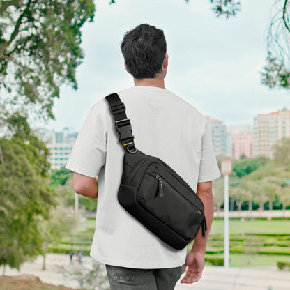 AFA07482 - Sling Bag KD410 in Black showing the bag on someone's back